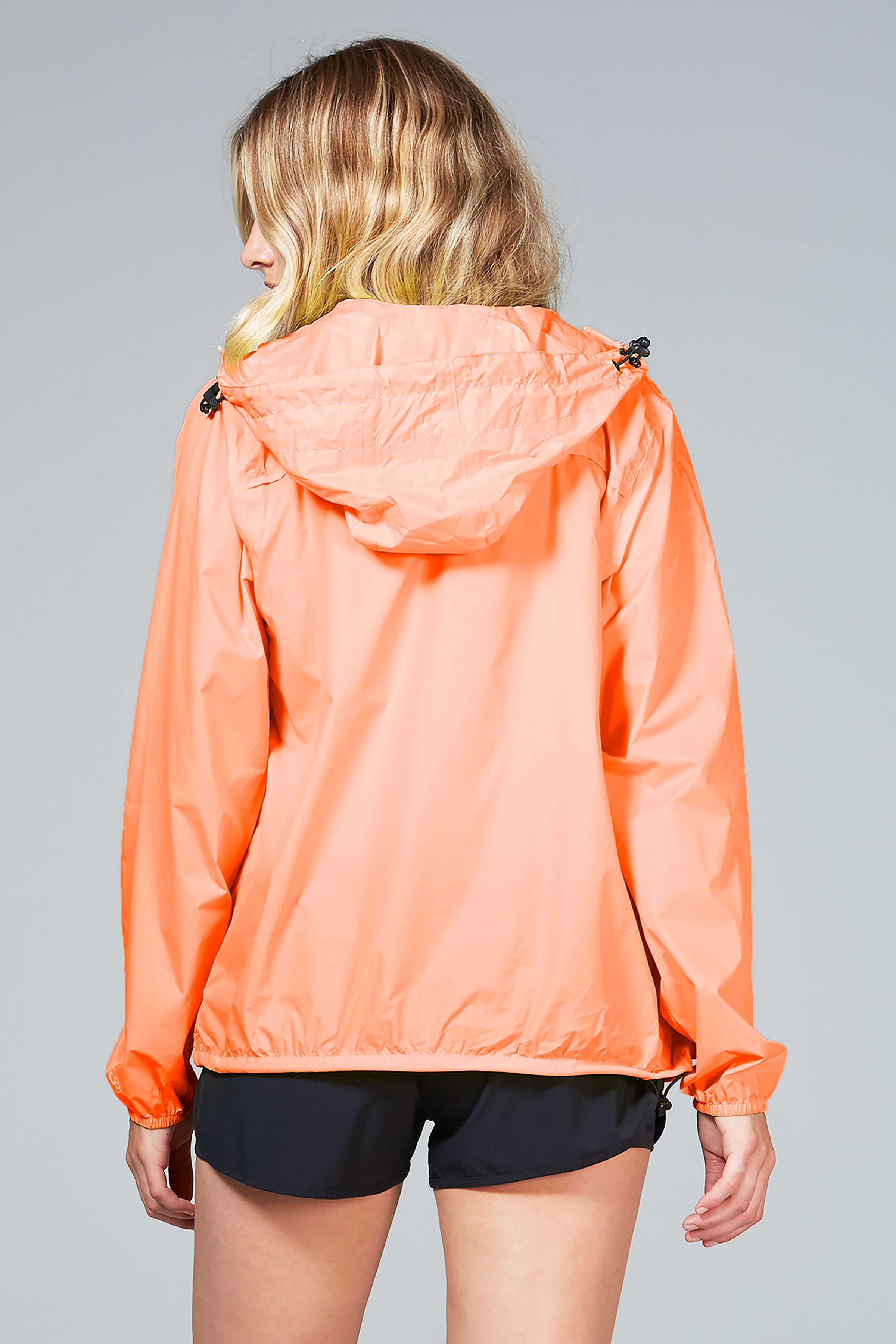 Women's orange fluo full zip packable rain jacket and windbreaker - O8Lifestyle