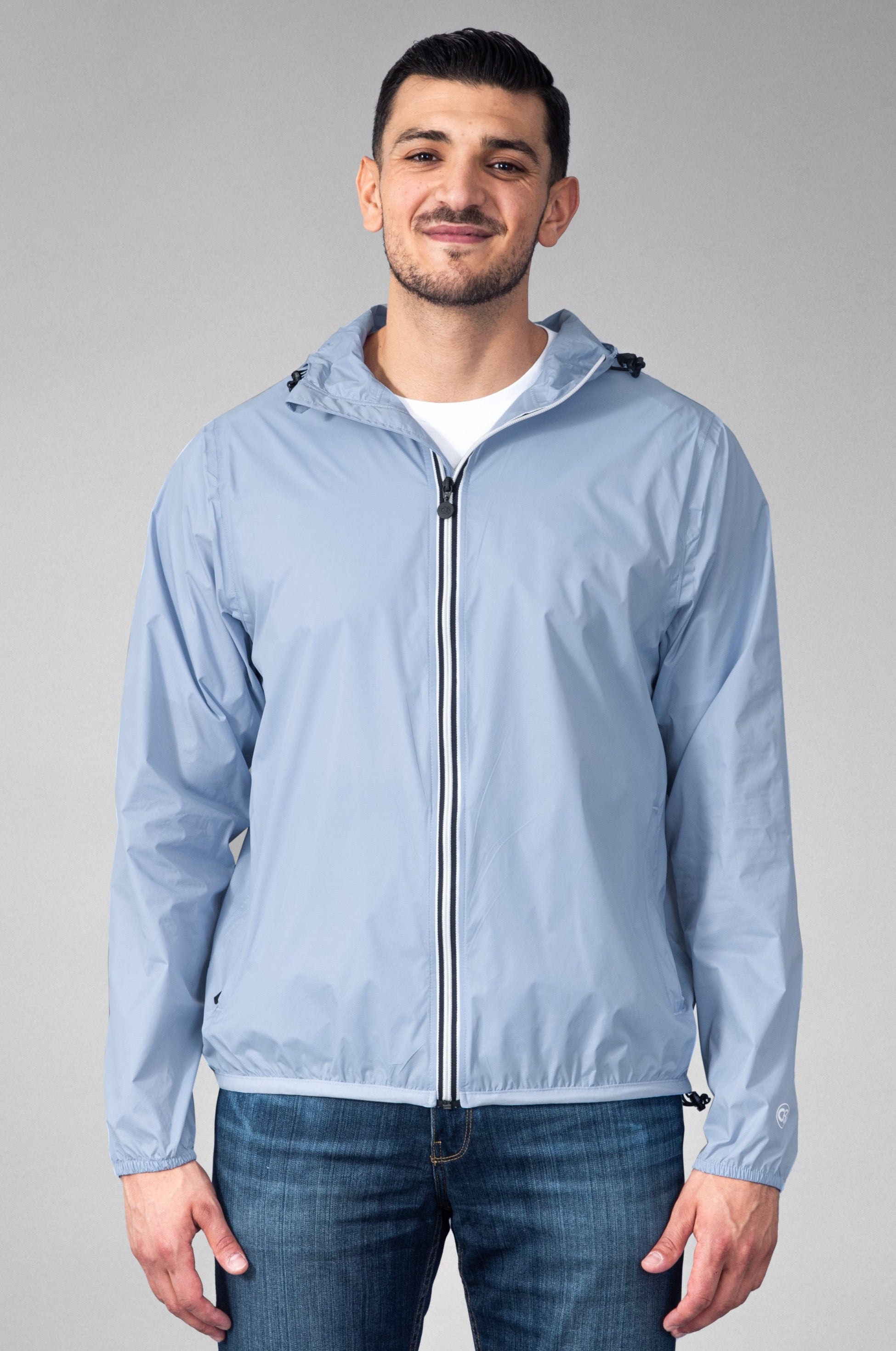 Men's packable rain jacket and windbreaker in powder blue