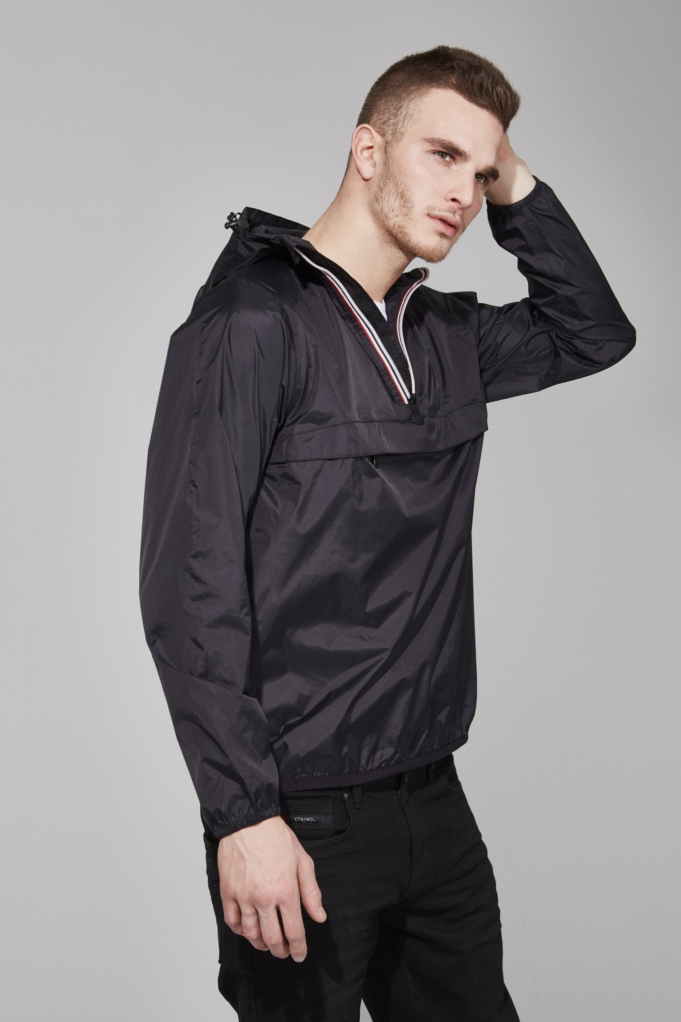 Quarter zip packable light rain jacket and windbreaker in black - O8Lifestyle