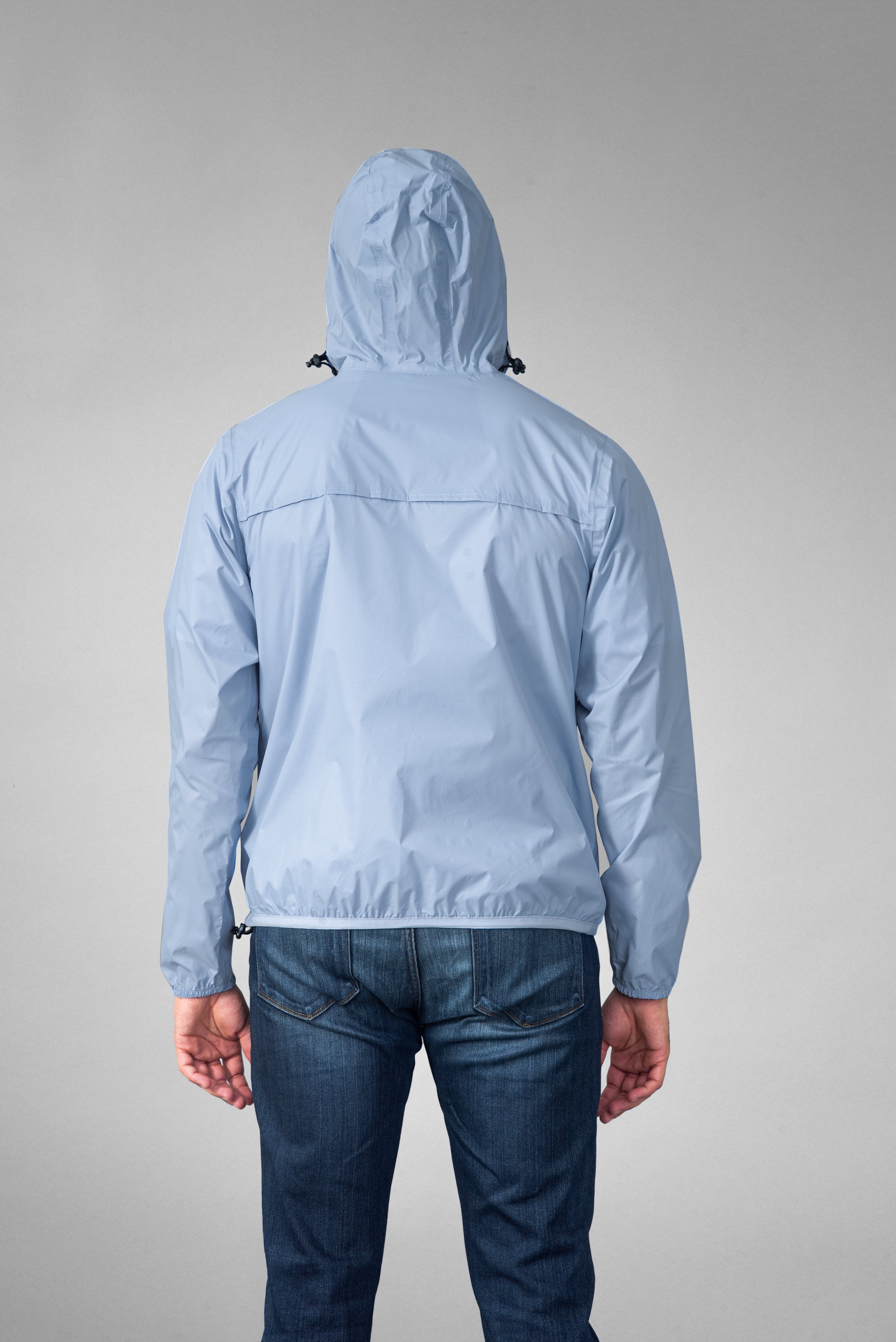 Powder blue full zip packable rain jacket and windbreaker