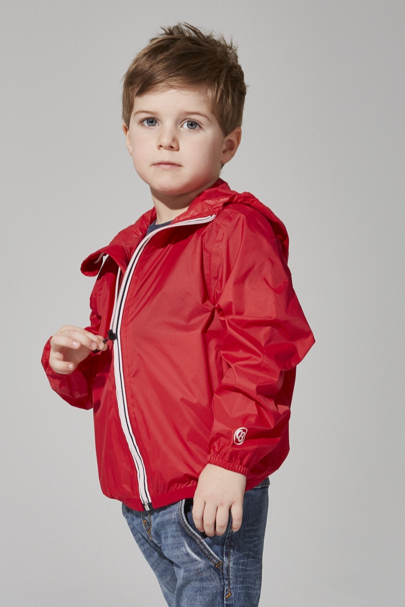 Kids red full zip packable rain jacket and windbreaker - O8Lifestyle