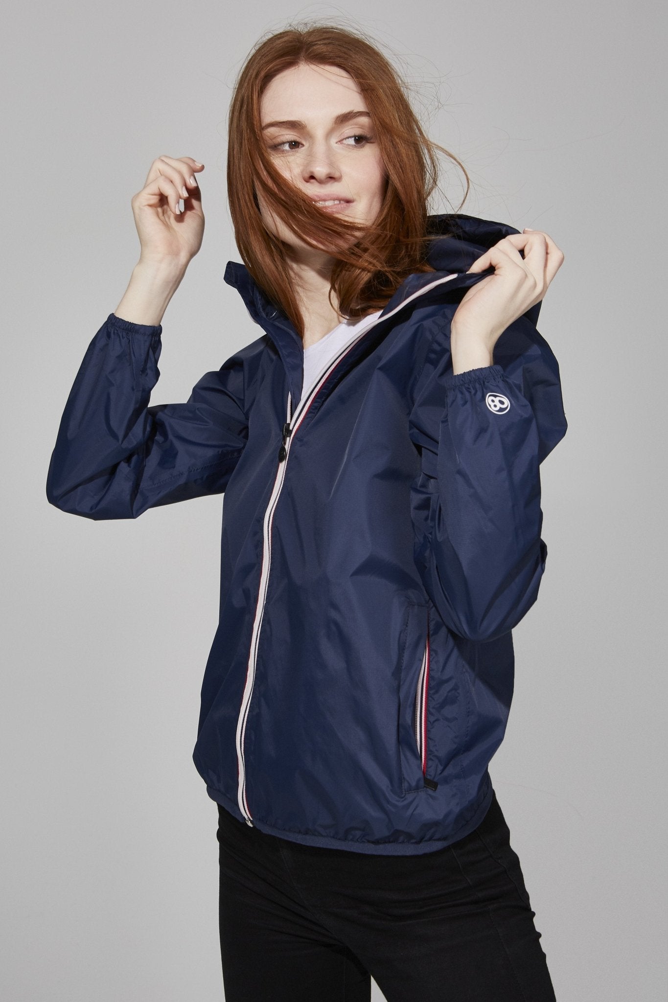 Women packable rain jacket and windbreaker in navy
